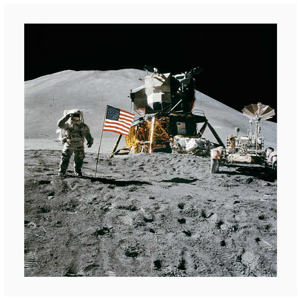 An astronaut saluting on the moon next to an american flag, lunar lander and a buggy.